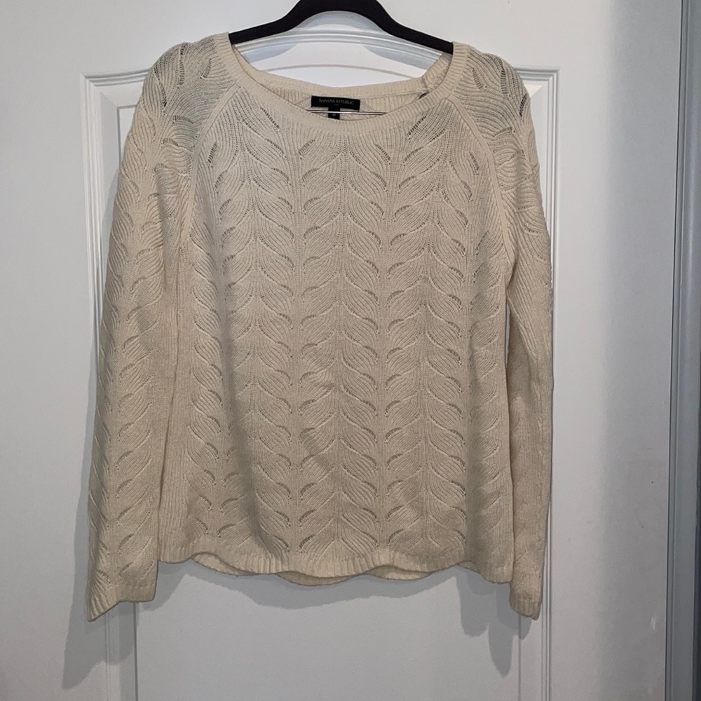 Cream colored knitted sweater